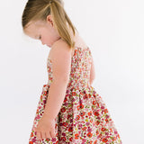 The Baby Smocked Dress in Poppy Floral