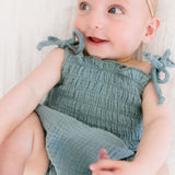 The Smocked Onesie in Aegean Blue