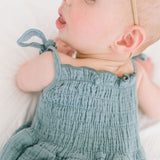 The Smocked Onesie in Aegean Blue