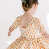 The Short Sleeve Ballet Dress in Carrots