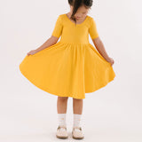 The Short Sleeve Ballet Dress in Gold