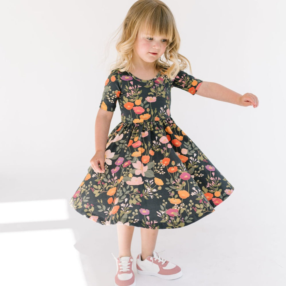 THE SHORT SLEEVE BALLET DRESS IN DARK BOTANICAL