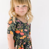 THE SHORT SLEEVE BALLET DRESS IN DARK BOTANICAL