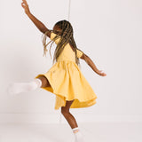 THE SHORT SLEEVE BALLET DRESS IN CARAMEL