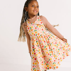 THE PINAFORE DRESS IN PETAL PARTY