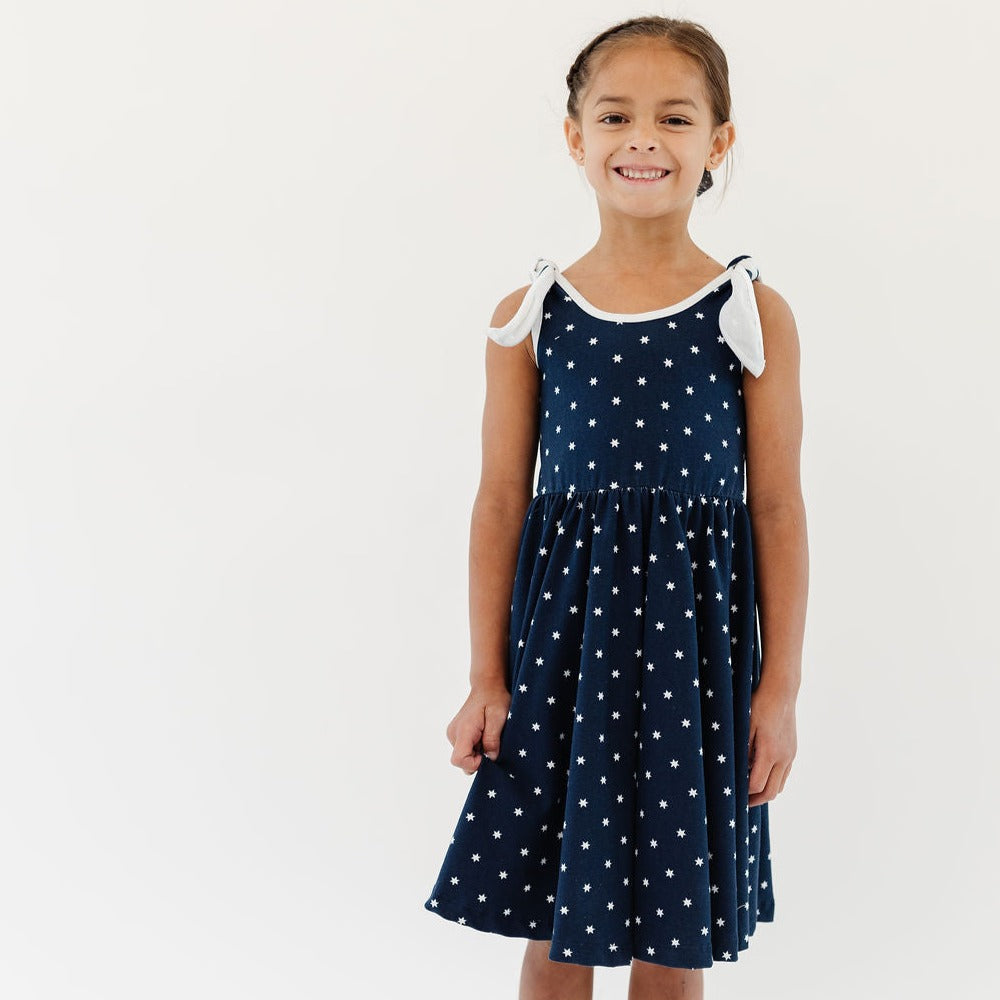 THE BOW TANK BALLET DRESS IN BLUE STARS