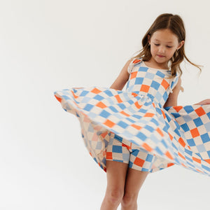 THE BOW TANK BALLET DRESS IN CHECKERBOARD