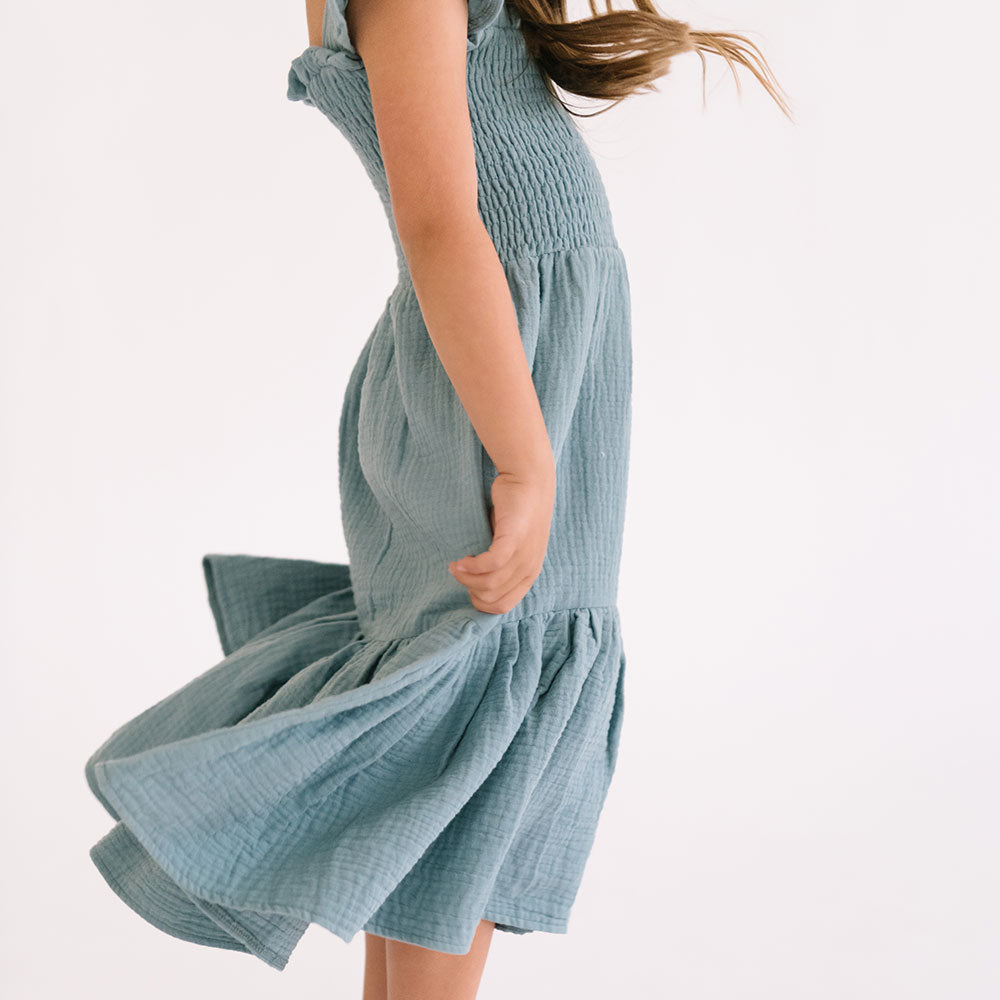 THE SMOCKED DRESS IN AEGEAN BLUE