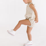 THE SMOCKED ONESIE IN KHAKI GINGHAM