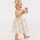 THE BABY SMOCKED DRESS IN KHAKI GINGHAM