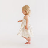 THE BABY SMOCKED DRESS IN KHAKI GINGHAM