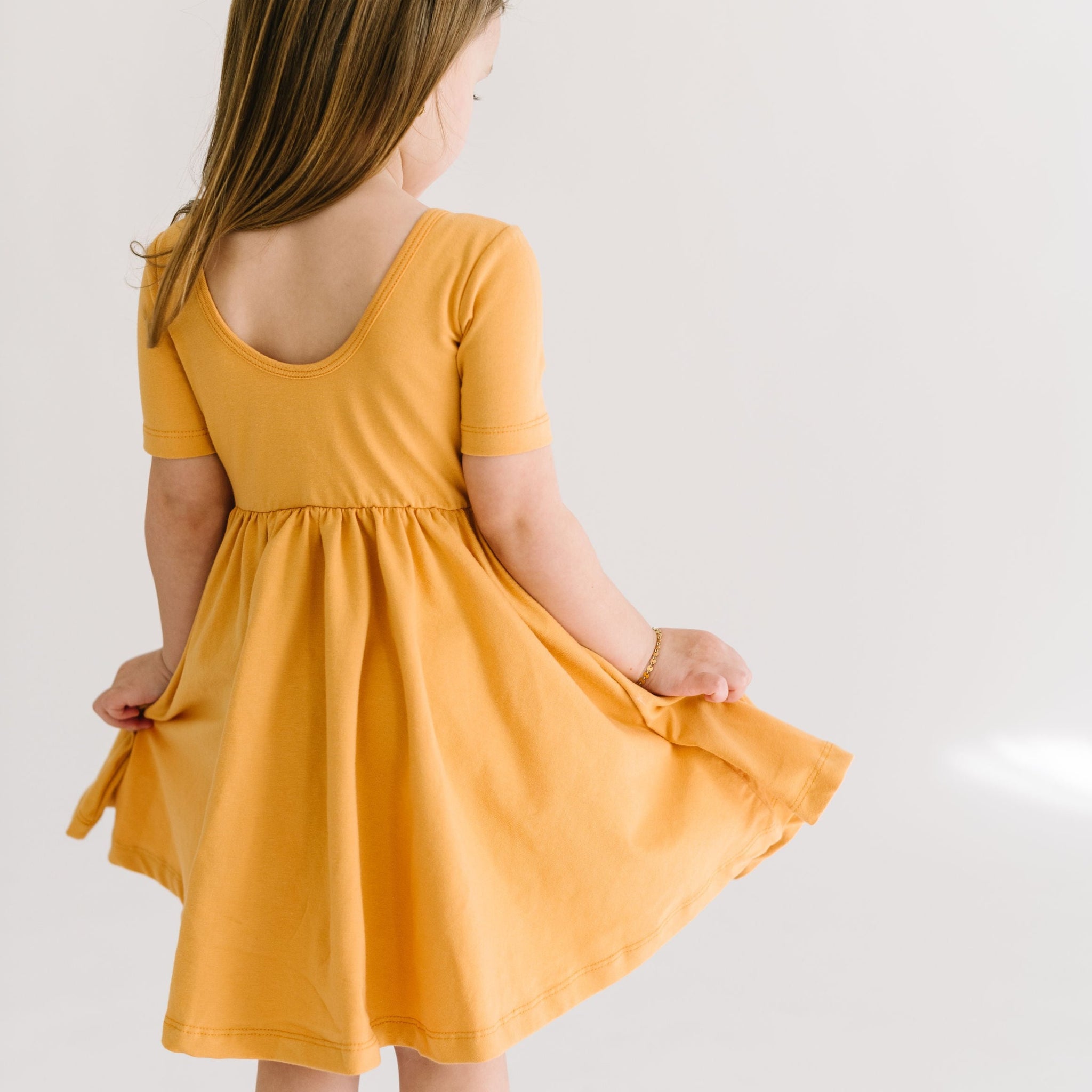 THE SHORT SLEEVE BALLET DRESS IN HONEY