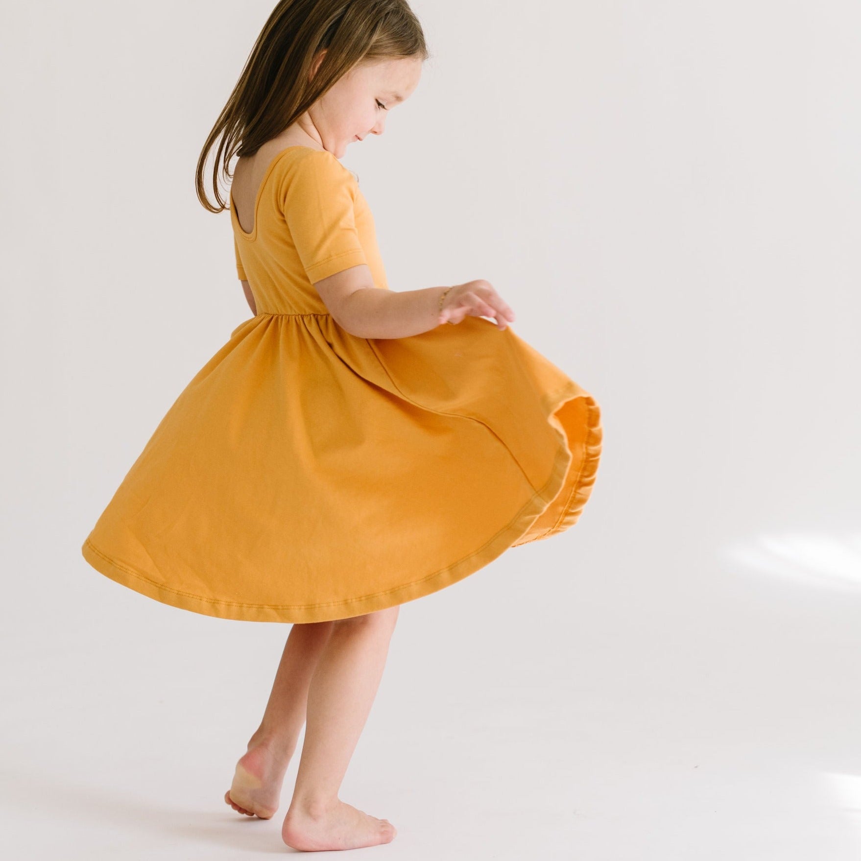 THE SHORT SLEEVE BALLET DRESS IN HONEY