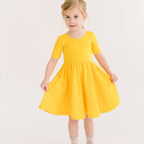 The Short Sleeve Ballet Dress in Lemon