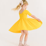 The Short Sleeve Ballet Dress in Lemon