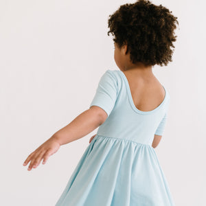 THE SHORT SLEEVE BALLET DRESS IN COOL BLUE