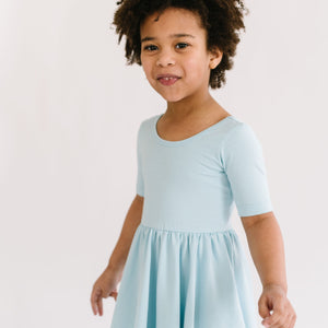 THE SHORT SLEEVE BALLET DRESS IN COOL BLUE