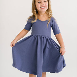 THE SHORT SLEEVE BALLET DRESS IN BLUE SEA