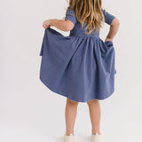 THE SHORT SLEEVE BALLET DRESS IN BLUE SEA