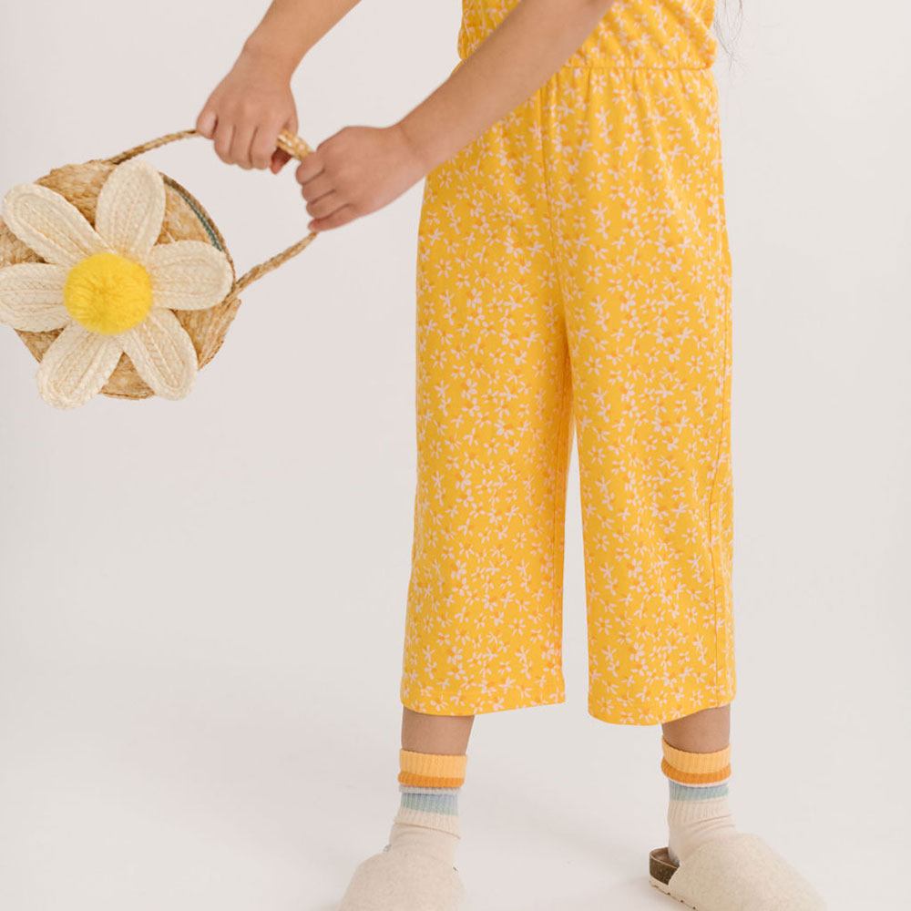 THE SHORT SLEEVE WIDE LEG JUMPSUIT IN ZINGY PETALS